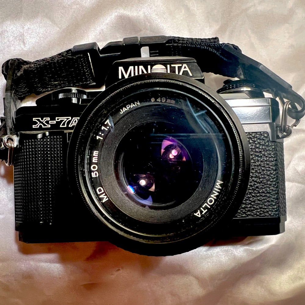 Minolta camera , vintage . All parts in place